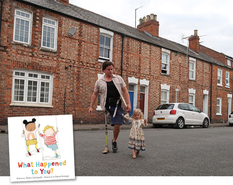 U.K. Author James Catchpole walking with his daughter