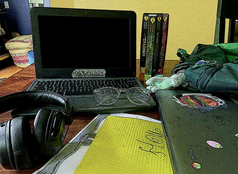 Photo of a Chromebook on a table at a student's home.